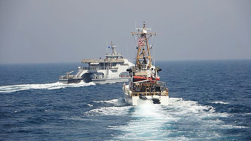In an April 2, 2021, photo released by the U.S. Navy, an Iranian Revolutionary Guard vessel cut in front of the U.S. Coast Guard ship USCGC Monomoy in the Persian Gulf. American and Iranian warships had a tense encounter in the Persian Gulf earlier this month, the first such incident in about a year amid wider turmoil in the region over Tehran's tattered nuclear deal, the U.S. Navy said Tuesday, April 27, 2021. (U.S. Navy via AP)