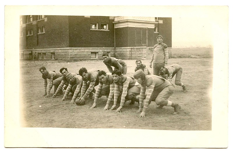 Conway, 1908: The high school football team was photographed at practice, in light equipment with no pads and only two players wearing helmets. At the time the population of the Faulkner County seat was less than 3,000; today it’s almost 70,000.
Arkansas Postcard Past, P.O. Box 2221, Little Rock, AR 72203
