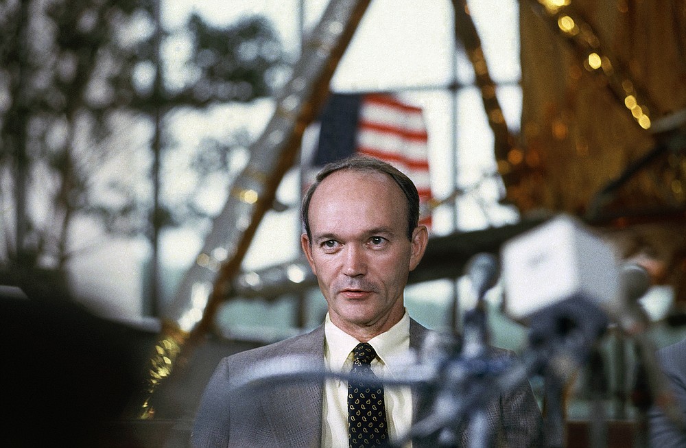 FILE - In this July 19, 1979 file photo, Apollo 11 astronaut Michael Collins attends a news conference on the 10th anniversary of historic moon landing. Collins, who piloted the ship from which Neil Armstrong and Buzz Aldrin left to make their historic first steps on the moon in 1969, died Wednesday, April 28, 2021, of cancer, his family said. He was 90. (AP Photo)