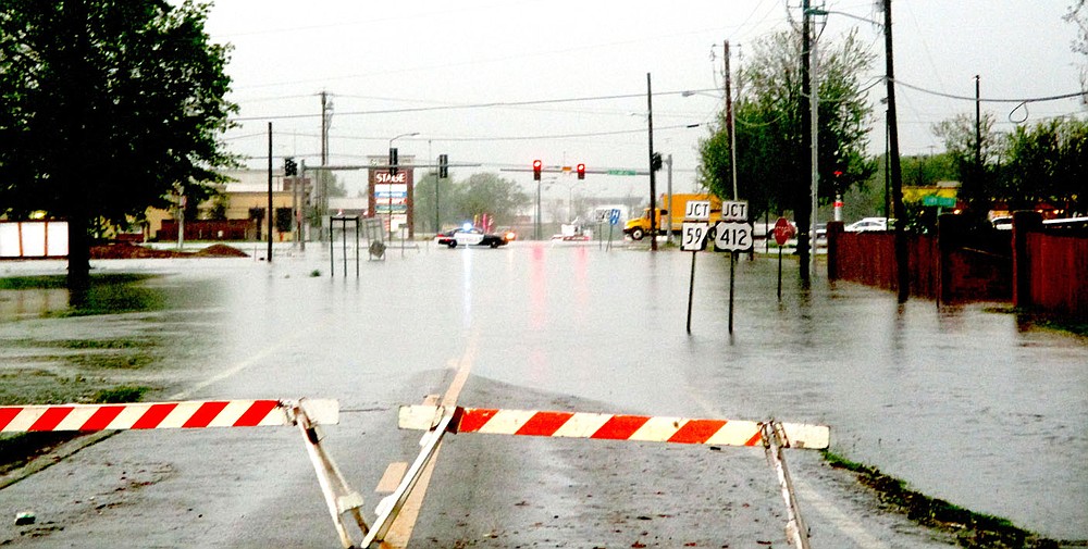 Marc Hayot/Siloam Sunday Major flooding hit Siloam Springs on Wednesday and flooded several roads out like Highway 16 East between U.S. Highway 412 East and Meridian Place.