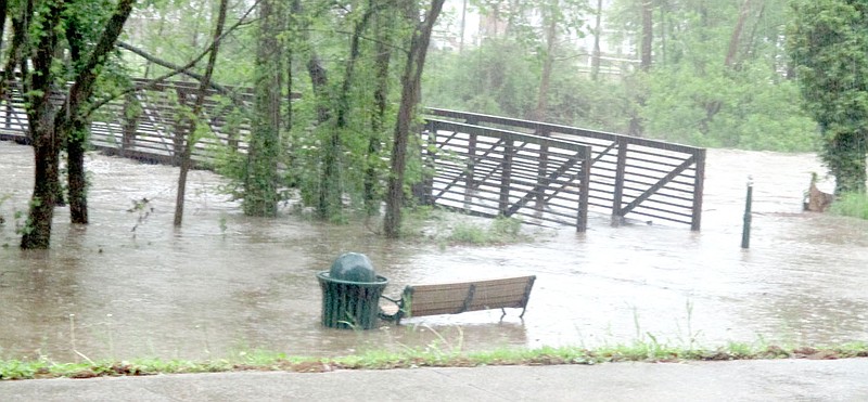 Marc Hayot/Siloam Sunday The Dogwood Trail at Bob Henry Park was flooded out due to excessive rain fall that came to Siloam Springs on Wednesday.