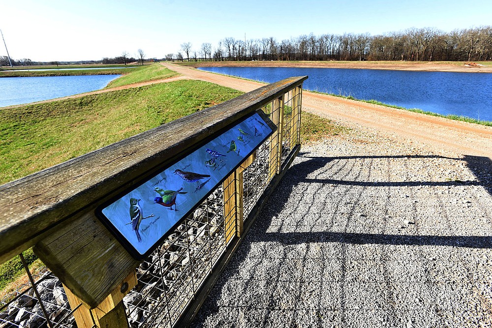 A display at a viewing pavilion helps people identify some of the birds they may see at the hatchery.
(NWA Democrat-Gazette/Flip Putthoff)