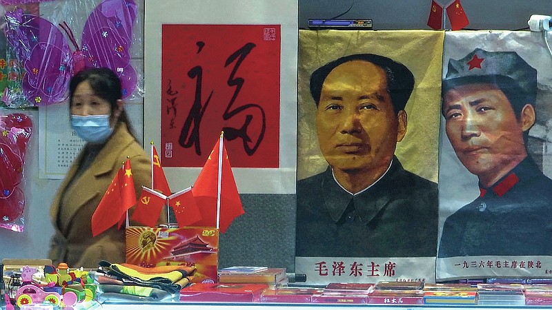 Souvenirs of the late Communist leader Mao Zedong are sold at a gift shop at the Jinggangshan Revolution Museum in Jinggangshan in southeastern China's Jiangxi province, on April 8, 2021. On the hundredth anniversary of the Chinese Communist Party, tourists in China are flocking to historic sites and making pilgrimages to party landmarks. (AP Photo/Emily Wang)