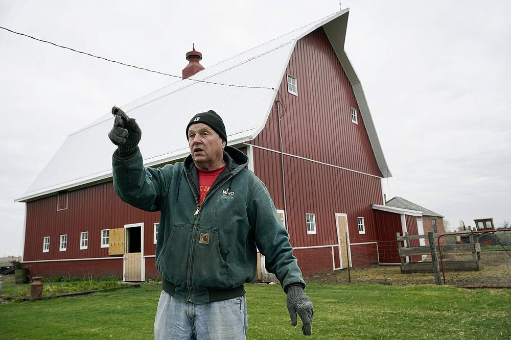CORRECTS YEARS OF FARMINGTO 43 YEARS INSTEAD OF 45 - Morey Hill speaks about his farming operation, Friday, April 16, 2021, near Madrid, Iowa. In 43 years of farming, Morey Hill had seen crop-destroying weather, rock-bottom prices, trade fights and surges in government aid, but not until last year had he endured it all in one season. Now, as Hill and other farmers begin planting the nation’s dominant crops of corn and soybeans, they’re dealing with another shift — the strongest prices in years and a chance to put much of the recent stomach-churning uncertainty behind them. (AP Photo/Charlie Neibergall)