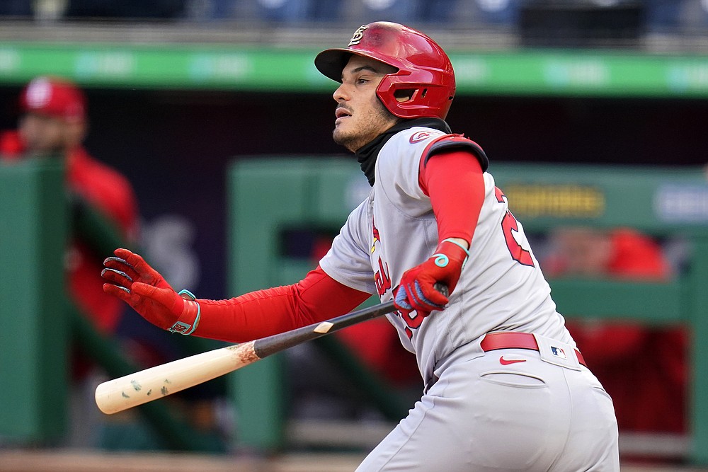 St. Louis Cardinals' Nolan Arenado watches his RBI double off Pittsburgh Pirates starting pitcher JT Brubaker during the first inning of a baseball game in Pittsburgh, Friday, April 30, 2021. (AP Photo/Gene J. Puskar)
