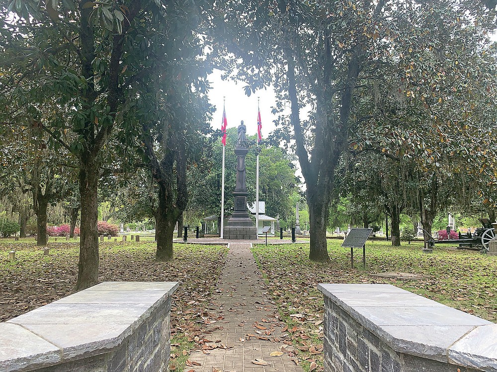 A chair carved out of limestone honoring Confederate President Jefferson Davis was stolen from Confederate Memorial Circle, a private section of Live Oak Cemetery, Tuesday, April 13, 2020, in Selma, Ala. Confederate Memorial Circle, including the brick base where the chair sat, is shown here. Police recovered the chair in New Orleans, La. (Kim Chandler/Associated Press)