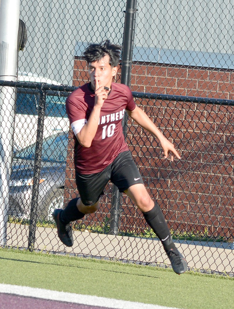 Graham Thomas/Siloam Sunday
Siloam Springs senior Franklin Cortez shushes the crowd after scoring a second half goal against Russellville to give the Panthers a 2-0 lead Friday at Panther Stadium.