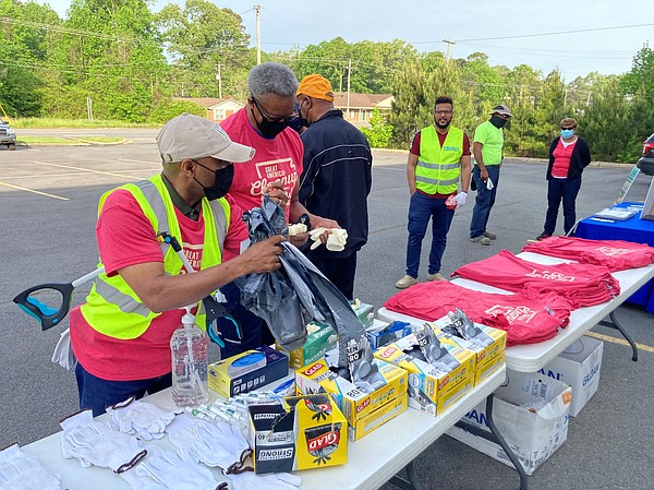 Volunteers Dispose Of Area's Litter 