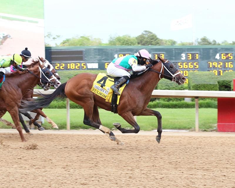 Fulsome and jockey Martin Garcia make their way across the wire to win the $300,000 Oaklawn Stakes on Saturday, May 1, 2021, at Oaklawn. - Photo courtesy of Coady Photography