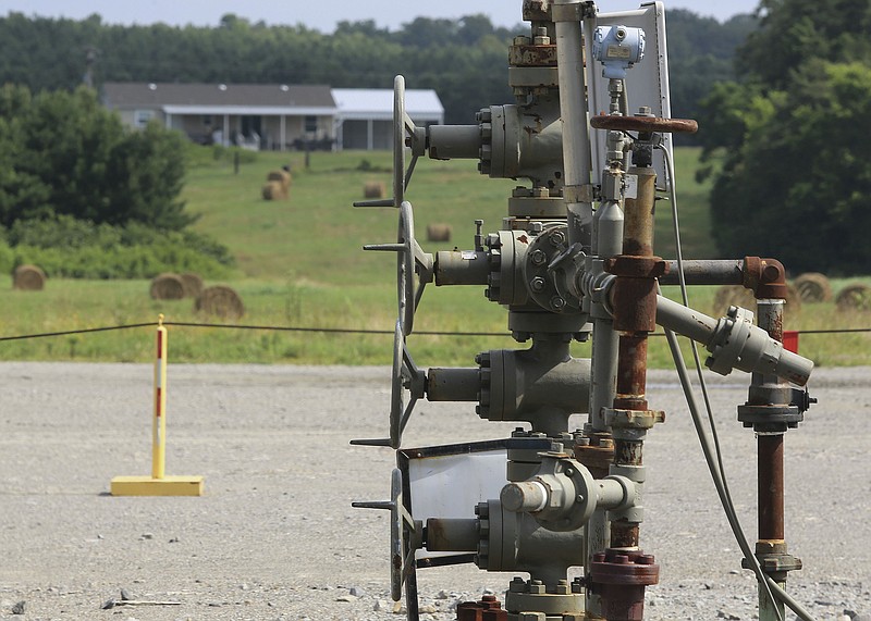 Arkansas Democrat-Gazette/STATON BREIDENTHAL --7/6/16-- Verlon Abram has several natural gas wells on his property in Cleburne County, including several within sight of his house.