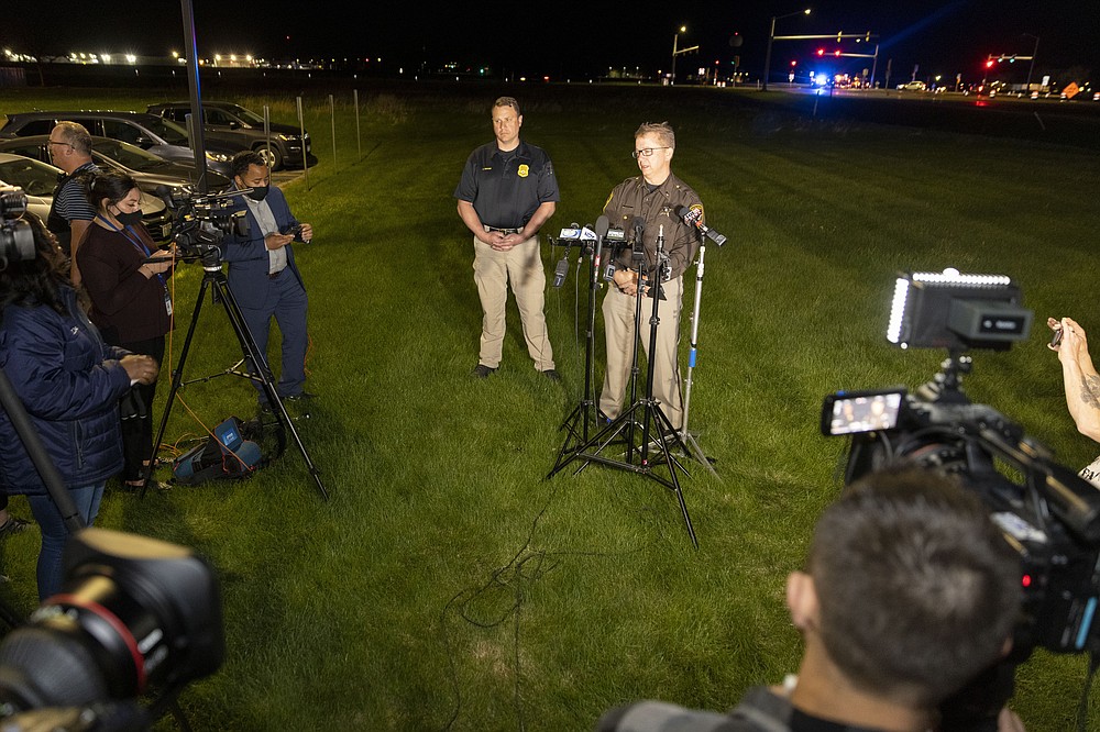 Lt. Kevin Pawlak of the Brown County Sheriff's Office talks to the media about a shooting incident with multiple fatalities at the Oneida Casino near Green Bay, Wis.,on Saturday May 1, 2021. Authorities in Wisconsin say a gunman killed two people at the casino restaurant and seriously wounded a third before he was shot and killed by police Saturday. (AP Photo/Mike Roemer)