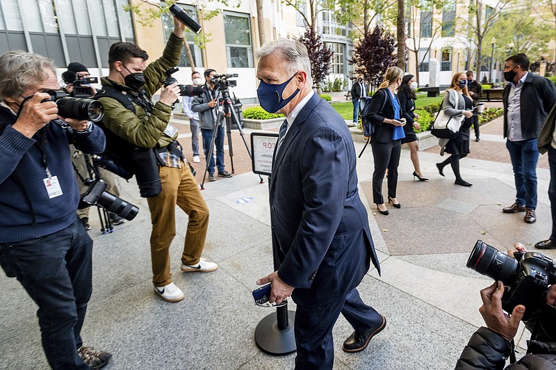 Phil Schiller, an Apple executive, enters the Ronald V. Dellums building in Oakland, Calif., on Monday, May 3, 2021, to attend a federal court case brought by Epic Games. Epic, maker of the video game Fortnite, charges that Apple has transformed its App Store into an illegal monopoly. (AP Photo/Noah Berger)