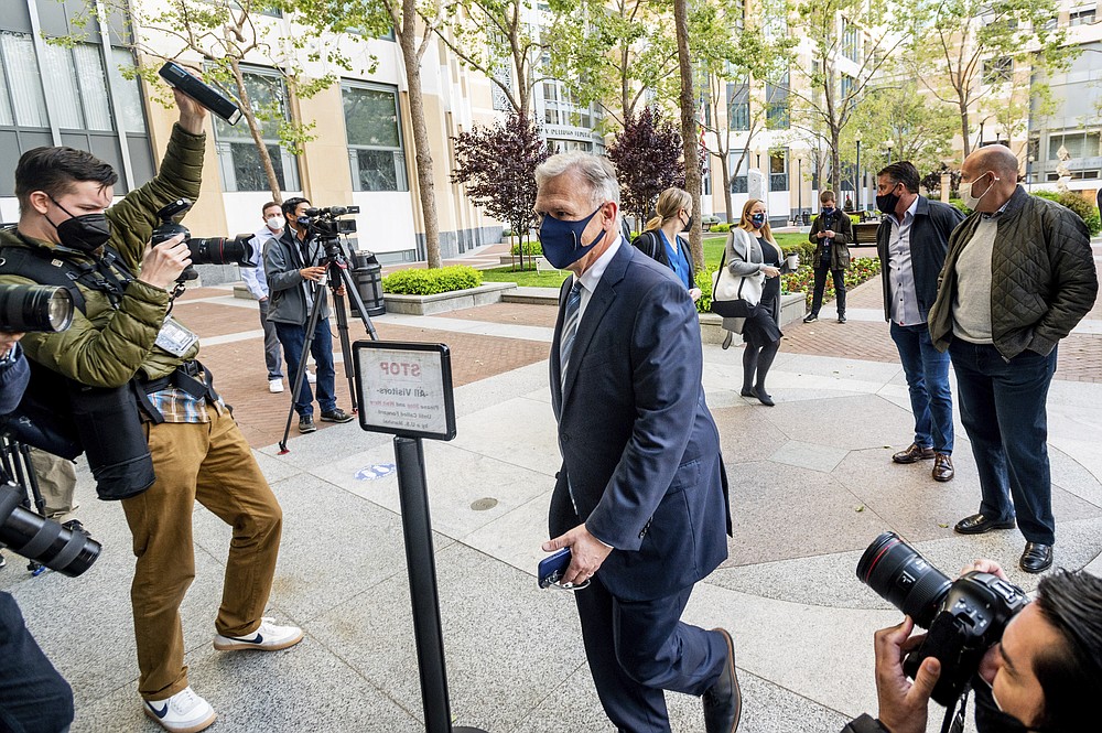 Phil Schiller, an Apple executive, enters the Ronald V. Dellums building in Oakland, Calif., on Monday, May 3, 2021, to attend a federal court case brought by Epic Games. Epic, maker of the video game Fortnite, charges that Apple has transformed its App Store into an illegal monopoly. (AP Photo/Noah Berger)