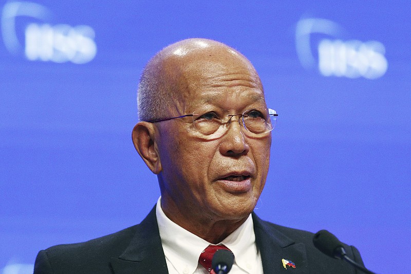 FILE - In this June 2, 2019, file photo, Philippine Secretary of National Defense Delfin Lorenzana speaks during the fifth plenary session of the 18th International Institute for Strategic Studies (IISS) Shangri-la Dialogue, an annual defense and security forum in Asia, in Singapore. Lorenzana rejected China’s demand that the Philippines end its patrols in the disputed region. (AP Photo/Yong Teck Lim, File)