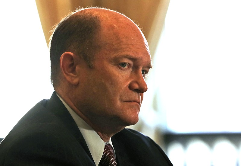 U.S. Senator Chris Coons listens to a journalist during a press briefing in Abu Dhabi, United Arab Emirates, Monday, May 3, 2021. Top Biden administration officials and U.S. senators crisscrossed the Middle East on Monday, seeking to assuage growing unease among key Gulf Arab partners over America's rapprochement with Iran and other policy shifts. (AP Photo/Kamran Jebreili)