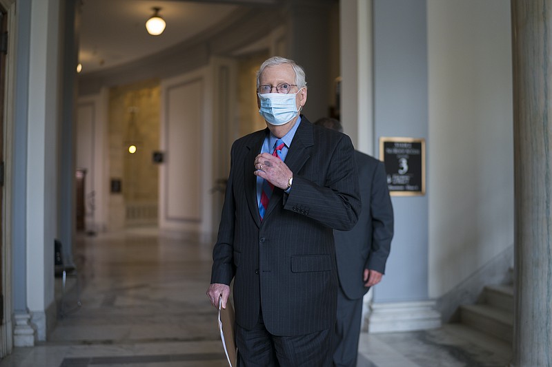 Senate Minority Leader Mitch McConnell, R-Ky., leaves a meeting with fellow Republicans on Capitol Hill in Washington, Thursday, April 29, 2021, the day after President Joe Biden addressed Congress on his first 100 days in office. (AP Photo/J. Scott Applewhite)