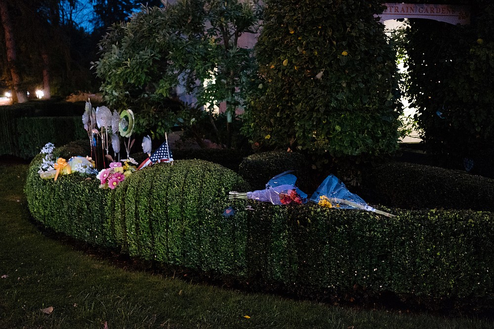 FILE - Flowers on a memorial outside the Tree of Life - or L'Simcha Synagogue in Pittsburgh on October 25, 2019, almost a year after the attack.  The community has decided to renovate their sanctuary but are rebuilding the rest of the Pittsburgh campus.  She has created a Hall of Memories dedicated to the 2018 attack when a shooter appeared at the Shabbat services and killed eleven worshipers.  (Michelle Gustafson / The New York Times)