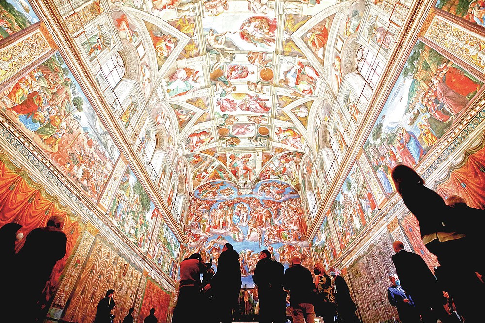 site visitors admire the Sistine Chapel associated with the Vatican Museums on the occasion associated with the museum's reopening, in Rome, Monday, May 3, 2021. The Vatican Museums reopened Monday to site visitors after a shutdown after COVID-19 containment measures. (AP Photo/Alessandra Tarantino)