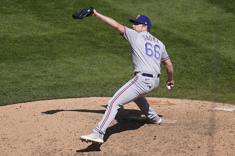 Texas Rangers' pitcher Josh Sborz (66) throws in relief against the Minnesota Twins in the 10th inning of a baseball game, Thursday, May 6, 2021, in Minneapolis. (AP Photo/Jim Mone)