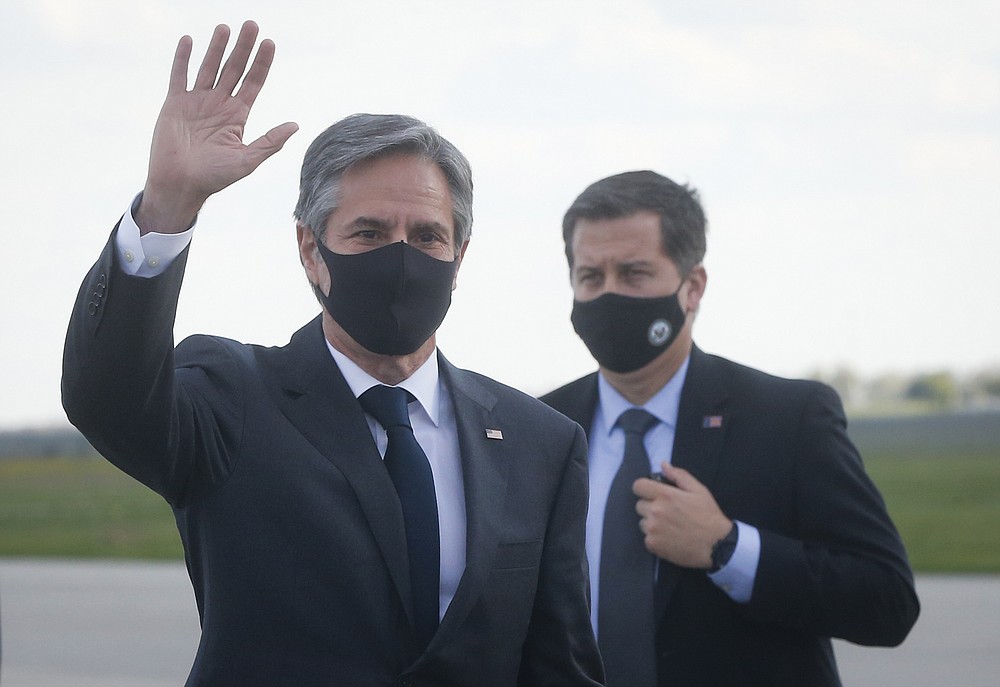 U.S. Secretary of State Antony Blinken waves upon departure from Boryspil International airport outside Kyiv, Ukraine, Thursday, May 6, 2021. U.S. Secretary of State Antony Blinken has met with top Ukrainian officials in Kyiv and reaffirmed Washington's support for the country in the wake of heightened tensions with Russia. (AP Photo/Efrem Lukatsky, Pool)