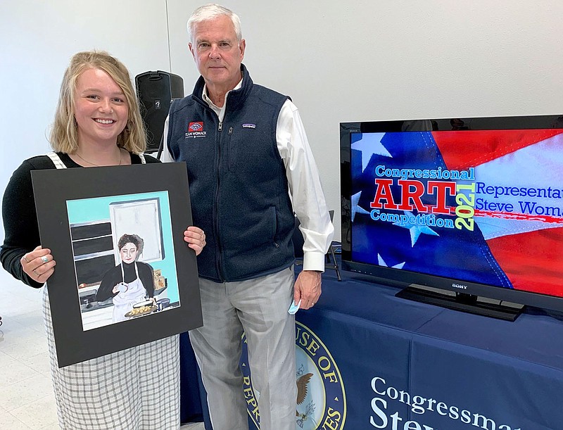 Photo submitted
Siloam Springs High School senior Sarah Bilby, winner of the 2021 Congressional Art Competition, poses for a photo with Congressman Womack at the award ceremony on April 28.