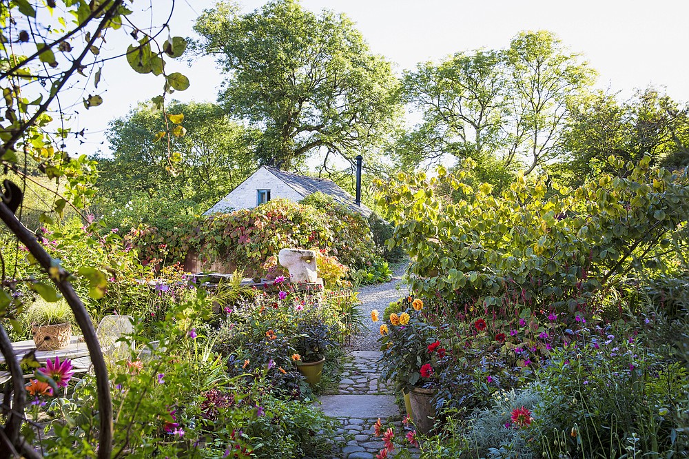 Author and tour organizer Carolyn Mullet finds a defining softness in European gardens granted by the emphasis on plants. At Dyffryn Fernant in Wales, the owner has transformed a neglected site into many discrete garden spaces. (Claire Takacs via The Washington Post)