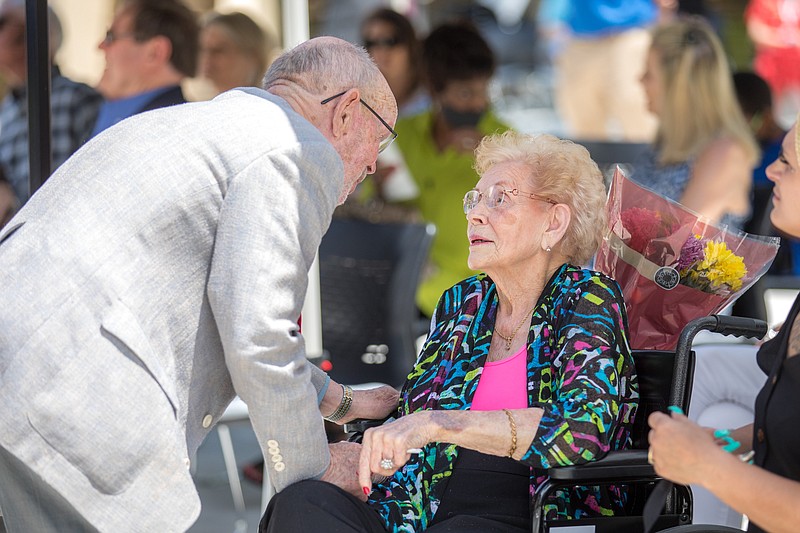 Former board of trustees board member Don Harris, left, speaks with Willodene Donathan at Friday’s dedication at National Park College. - Submitted photo