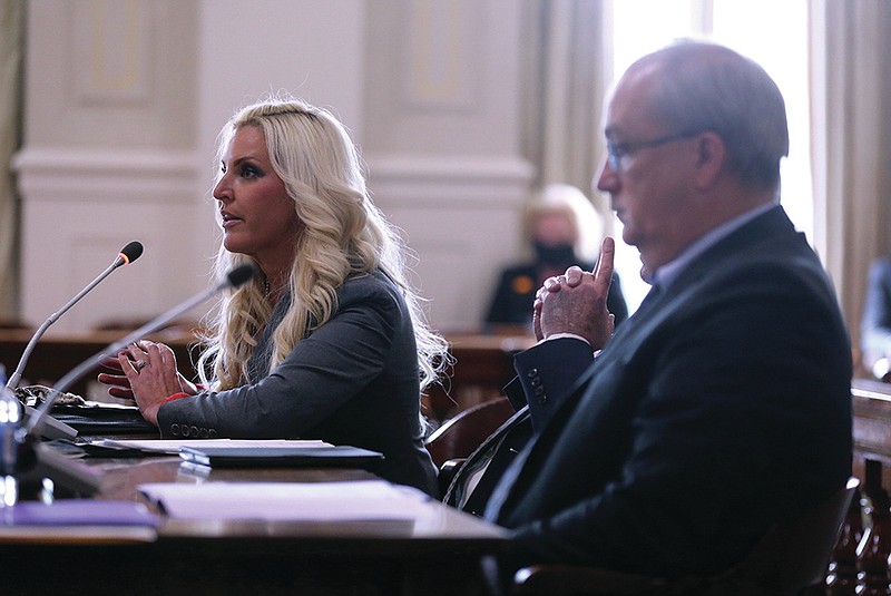 Kristi Stahr (left) answers a question as Sen. Kim Hammer (right), R-Benton, listens while presenting a series of bills amending election laws during the Senate State Agencies Committee on Tuesday, March 30, 2021, at the state Capitol in Little Rock. 
(Arkansas Democrat-Gazette/Thomas Metthe)