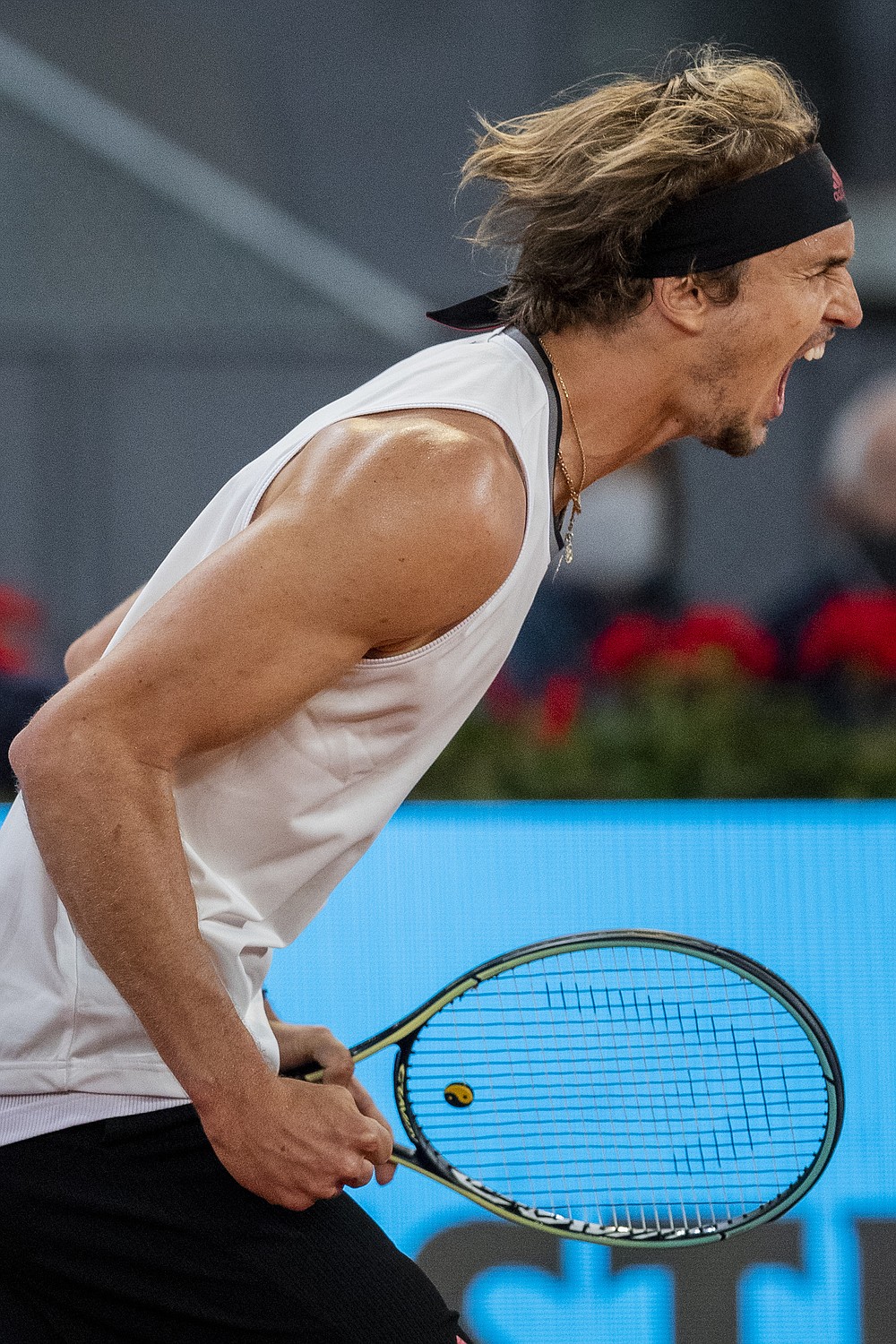 Germany's Alexander Zverev celebrates a point against Italy's Matteo Berrettini during the men's final match at the Mutua Madrid Open tennis tournament in Madrid, Spain, Sunday, May 9, 2021. (AP Photo/Bernat Armangue)