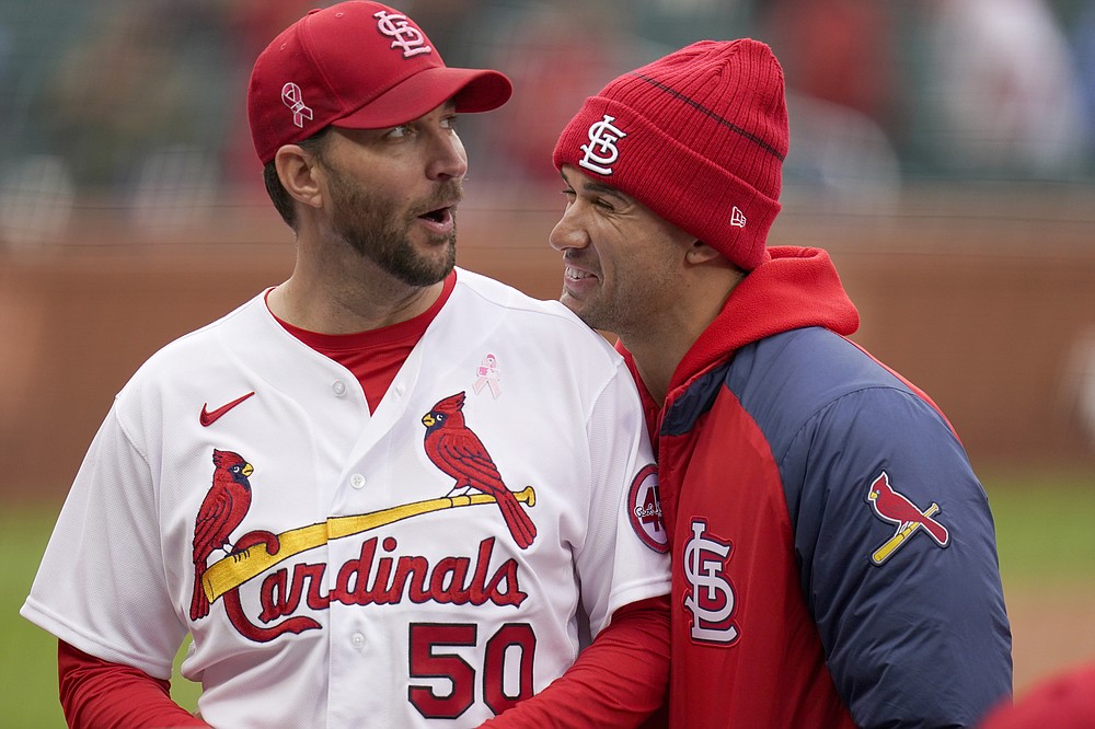 St. Louis Cardinals closer Adam Wainwright races off the mound while trying  to make a play in the ninth inning of the Cardinals 2-0 victory over the  San Diego Padres in Game