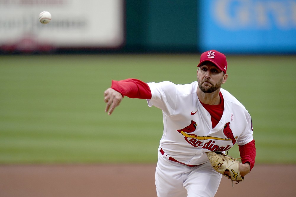 St. Louis Cardinals starting pitcher Adam Wainwright throws during the first inning of a baseball game against the Colorado Rockies Sunday, May 9, 2021, in St. Louis. (AP Photo/Jeff Roberson)