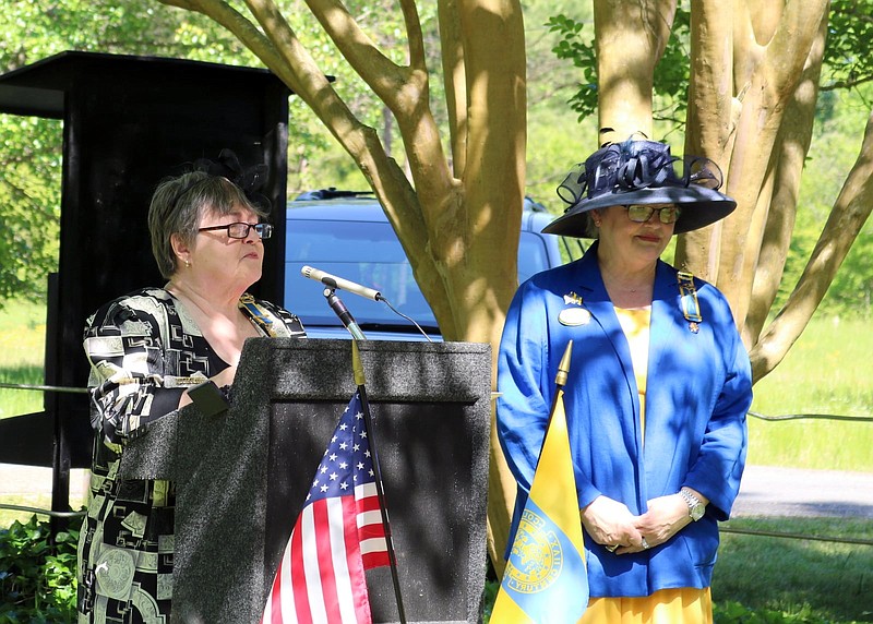 Jerrie Townsend, chaplain of the John Eliot Chapter Colonial Dames 17th Century, and Chapter President Sharon Wyatt conduct the dedication. (Special to The Commercial)