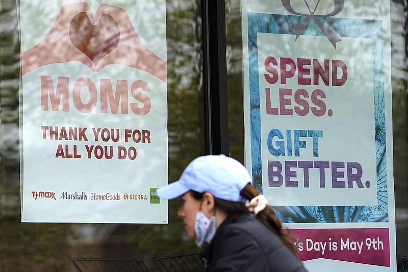 Signs about Mother's Day are displayed at a home decor department store in Northbrook, Ill., Saturday, May 8, 2021. (AP Photo/Nam Y. Huh)