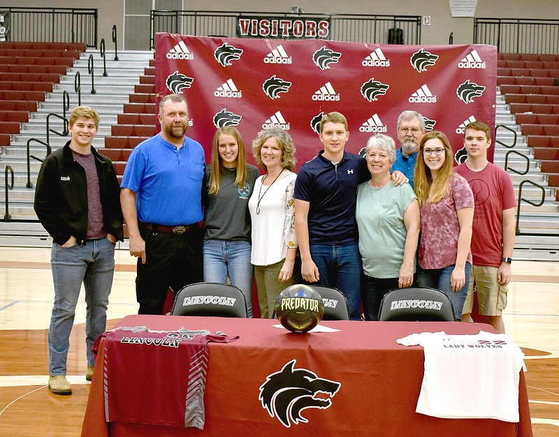 MARK HUMPHREY  ENTERPRISE-LEADER/Lincoln senior Sena Lund, third from left, accompanied by her family, signed a national letter of intent to play women's college soccer for Allen Community College, of Iola, Kan., on Friday. She is the first player from Lincoln's soccer program to achieve such a distinction.