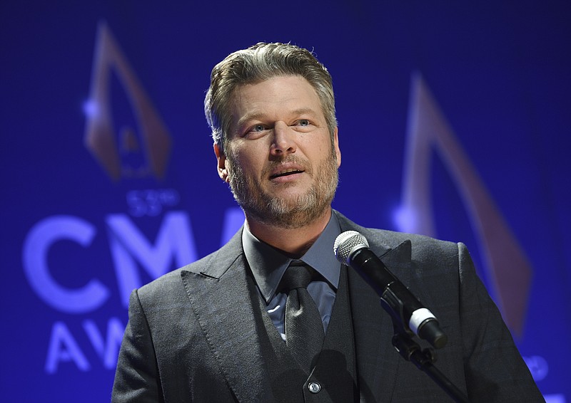 FILE - In this Nov. 13, 2019, file photo, singer Blake Shelton speaks in the press room after winning single of the year award for "God's Country" at the 53rd annual CMA Awards at Bridgestone Arena in Nashville, Tenn. The CMA will provide 4 million meals in cities with large populations of musicians and music industry professionals in partnership with Feeding America, and will also launch a donation challenge to fund  additional meals through its MICS Covid-19 initiative Monday, May 10, 2021. Shelton said he is proud to be part of the initiative and drumming up more support to raise funds for the food banks. (Photo by Evan Agostini/Invision/AP, File)