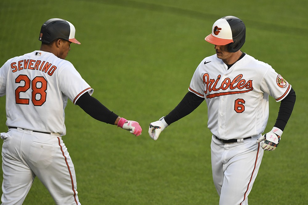 Baltimore Orioles' Ryan Mountcastle (6) celebrates his first-inning home run with Pedro Severino (28) during a baseball game against the Boston Red Sox, Monday, May 10, 2021, in Baltimore. (AP Photo/Terrance Williams)