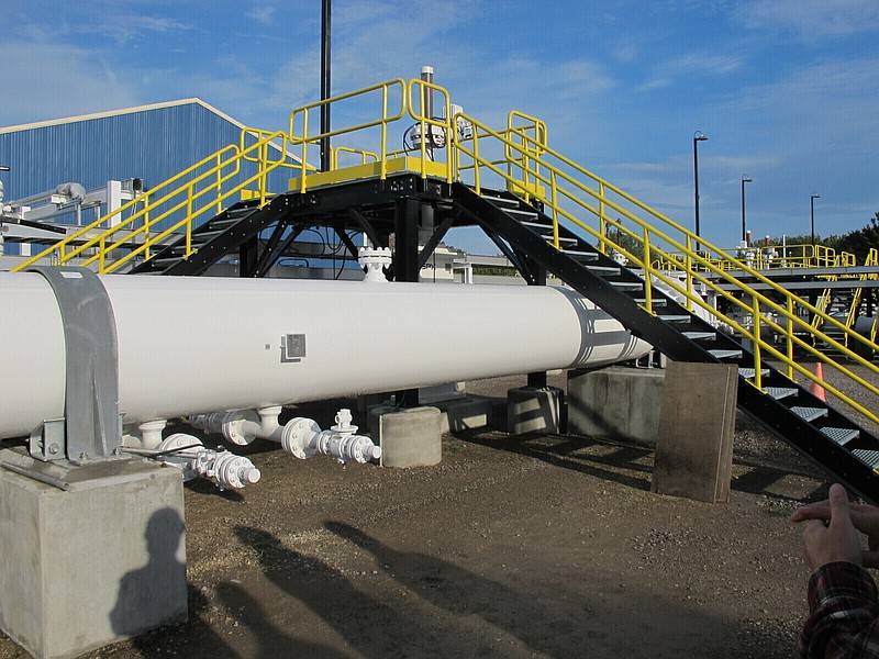 FILE - In this October 2016, file photo, is an aboveground section of Enbridge's Line 5 at the Mackinaw City, Mich., pump station. Michigan Gov. Gretchen Whitmer is threatening to go after Enbridge's profits from a Great Lakes oil pipeline if it isn't shut down. The Democratic governor issued the warning Tuesday, May 11, 2021, in a letter to Enbridge, a Canadian oil transport company. (AP Photo/John Flesher, File)