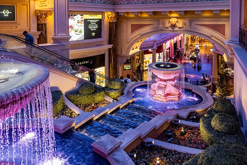 Visitors walk through the Forum Shops at Caesars Palace hotel and casino in Las Vegas, on May 2, 2021. MUST CREDIT: Bloomberg photo by Roger Kisby.