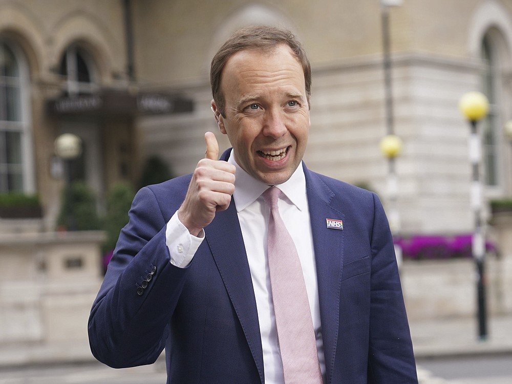 Britain's Health Secretary Matt Hancock gestures as he arrives at BBC Broadcasting House for his appearance on the current affairs programme, The Andrew Marr Show, in London, Sunday May 16, 2021. Cases of a virus variant first identified in India have more than doubled in a week, defying a sharp nationwide downward trend in infections won by months of restrictions and a rapid vaccination campaign.
Hancock said the variant, formally known as B.1.617.2, is more transmissible than the U.K.’s main strain, and “it is likely it will become the dominant variant.” (Yui Mok/PA via AP)
