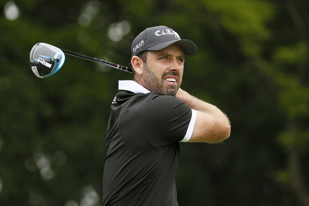 Charl Schwartzel, of South Africa, watches his tee shot on the second hole during the final round of the AT&T Byron Nelson golf tournament in McKinney, Texas, Sunday, May 16, 2021. (AP Photo/Ray Carlin)