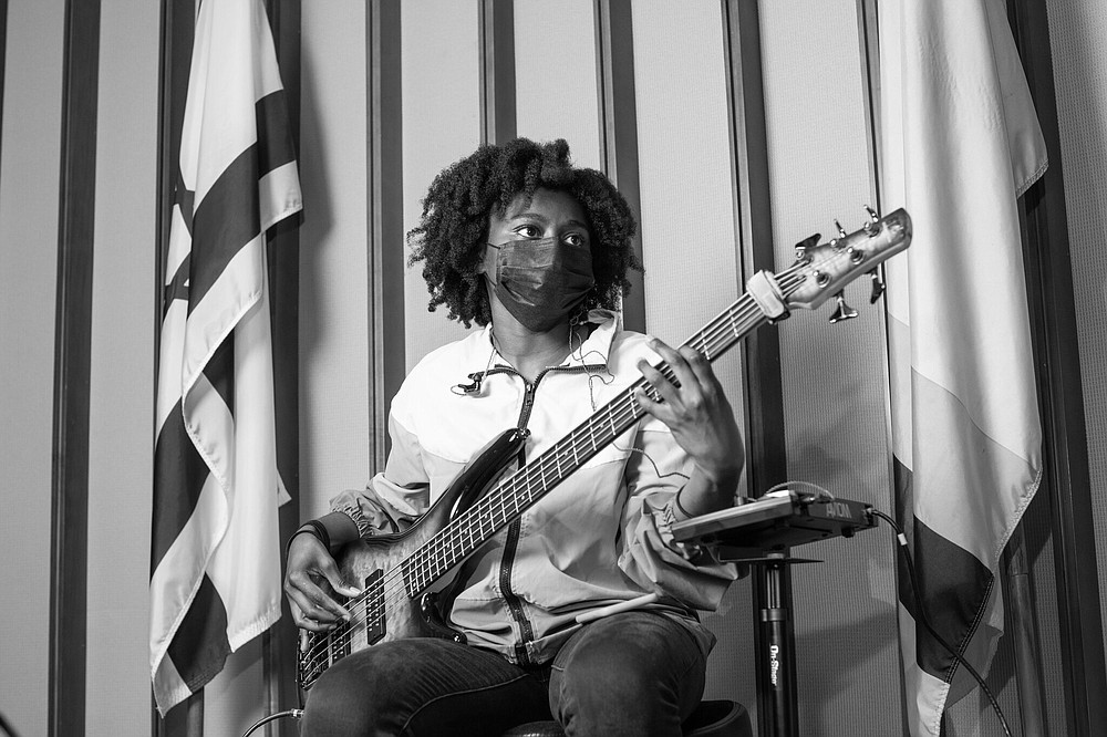 Kiera Yankson, a guest musician, sits in with the band at Bethel.
(The New York Times/Hannah Price)