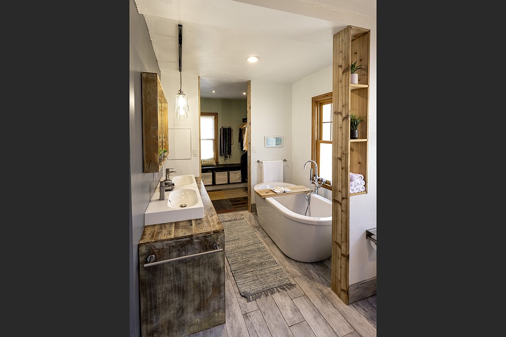 This image shows the remodeled bathroom and closet at the home of Wale Falade and Funmi Okanla-Falade in St. Paul, Minn. (TNS/Minneapolis Star Tribune/Carlos Gonzalez)