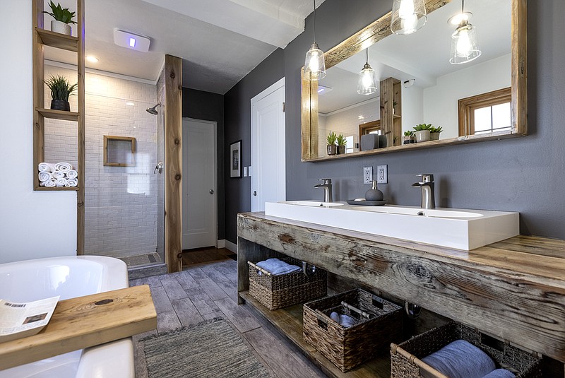 When they couldn’t find one large enough, the pair created a custom vanity — with a large double sink. (TNS/Minneapolis Star Tribune/Carlos Gonzalez)