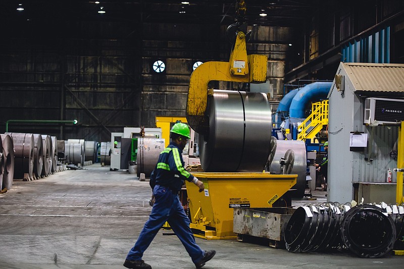 A finished steel coil is lifted and moved at the NLMK Pennsylvania plant in Farrell, Penn., on Sept. 19, 2019. MUST CREDIT: Bloomberg photo by Allison Farrand.
