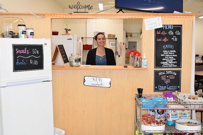 PHOTO BY ALEXUS UNDERWOOD/SPECIAL TO MCDONALD COUNTY PRESS. Sarah Allen, marketing and customer relations manager for Commerce Coffee Shop, in the shop's kitchen. Allen will soon be adding sandwiches to the Commerce Coffee Shop menu.