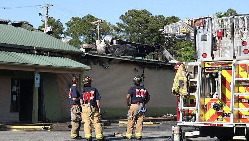 Firefighters battled a May 14 blaze at Sims Bar-B-Que on Geyer Springs Road in Little Rock. (Arkansas Democrat-Gazette/William Sanders)