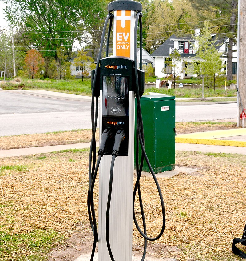 Marc Hayot/Siloam Sunday The city's electric vehicle charging station was installed around April 20 at 205 E. Jefferson St. across the street from the Siloam Springs Public Library, according to a post on the city's website. It contains two charging ports for electric vehicles, according the post states. The fee to charge a vehicle is 25 cents per kilowatt hour, the post states. Charging time will take 2 hours and cost around $3.30, the post states.