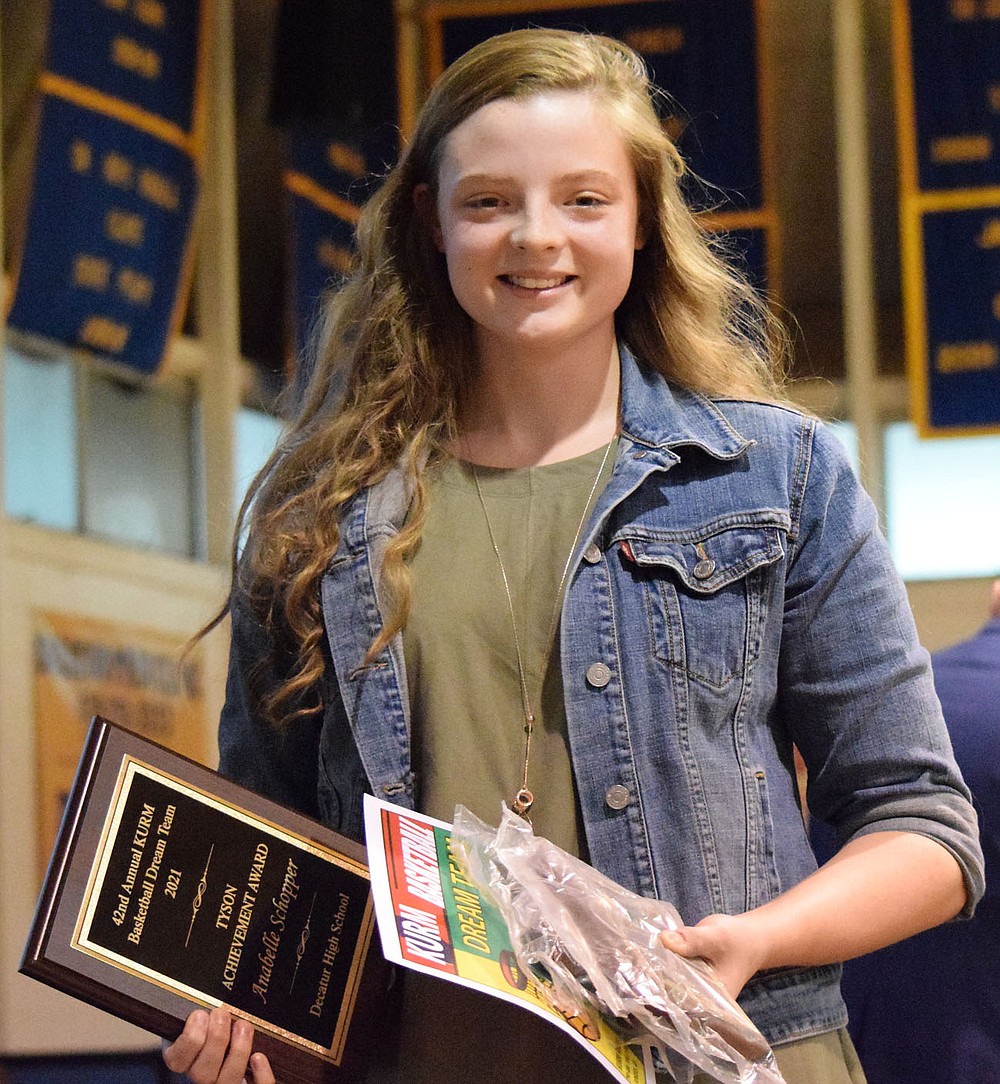 Westside Eagle Observer/MIKE ECKELS
Senior Anabelle Schopper displays several awards she received during the 2021 Bulldogs Sports Award program at Peterson Gym in Decatur May 18. Schopper was named 2021 Lady Bulldogs Basketball Most Valuable Player as well as Tyson Achievement and KURM 2021 Basketball Dream Team awards.