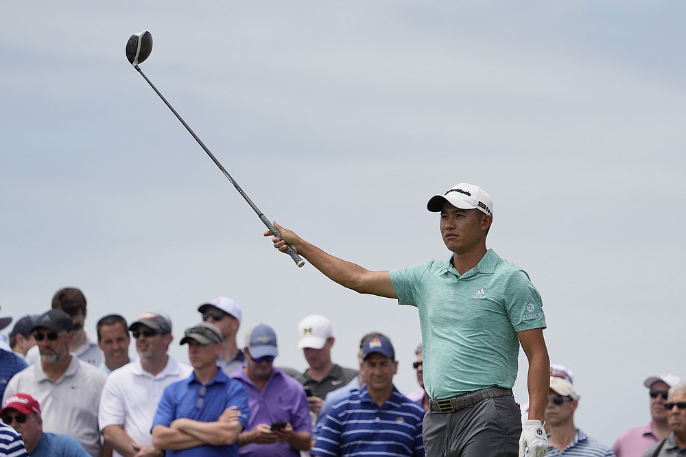 Collin Morikawa watches his tee shot on the 15th tee during a practice round at the PGA Championship golf tournament on the Ocean Course Wednesday, May 19, 2021, in Kiawah Island, S.C. (AP Photo/David J. Phillip)