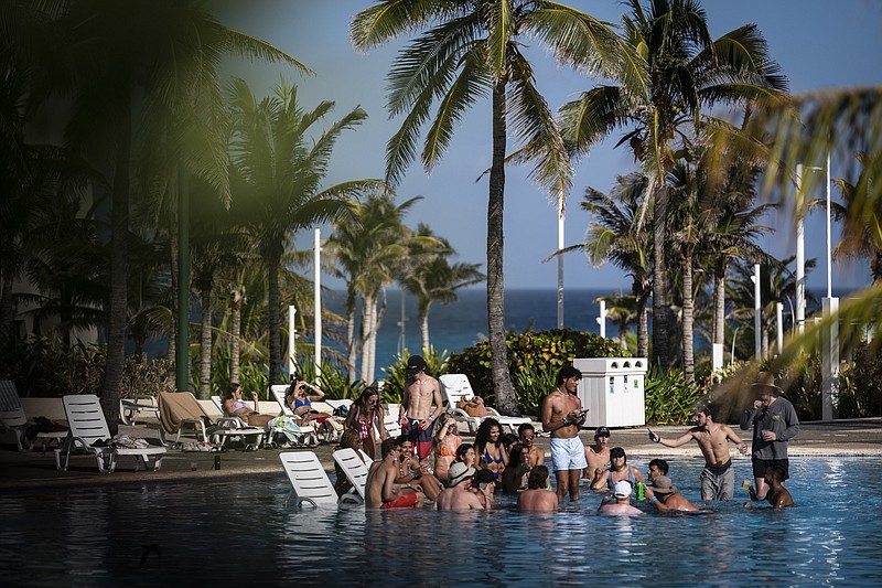 Tourists at the Grand Oasis Cancun resort in March. MUST CREDIT: Washington Post photo by Jabin Botsford.